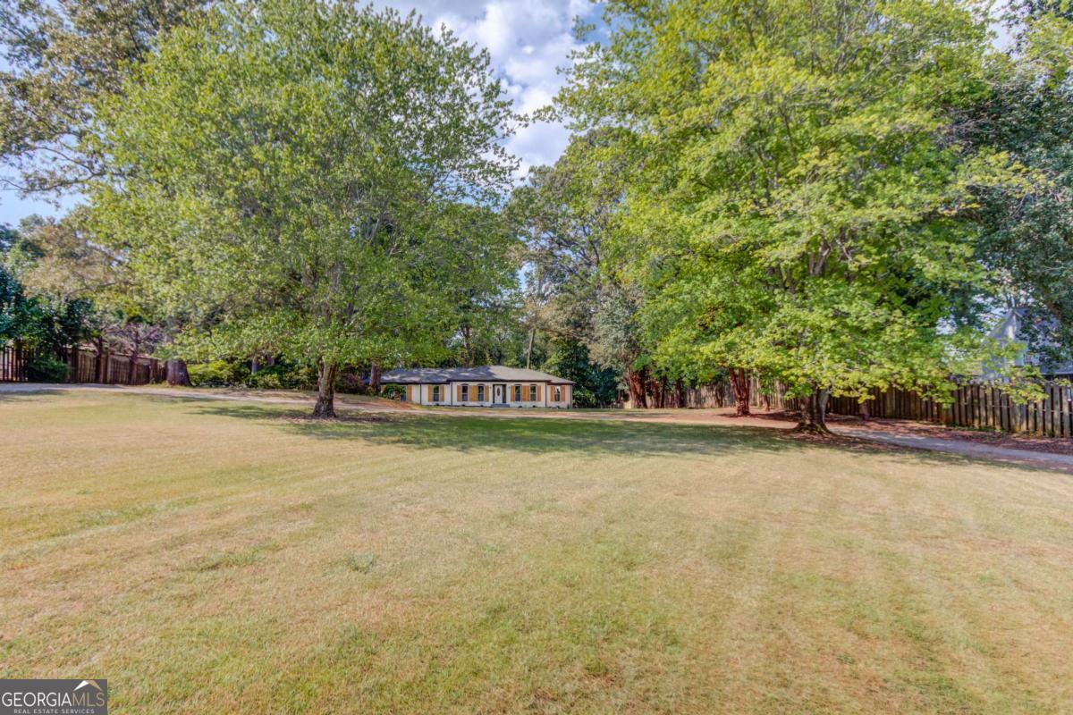 Property Photo:  105 Simonton Road  GA 30046 