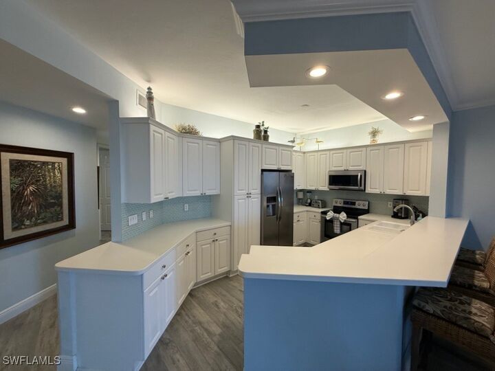 Property Photo: 410 Flagship Drive 305 FL 34108