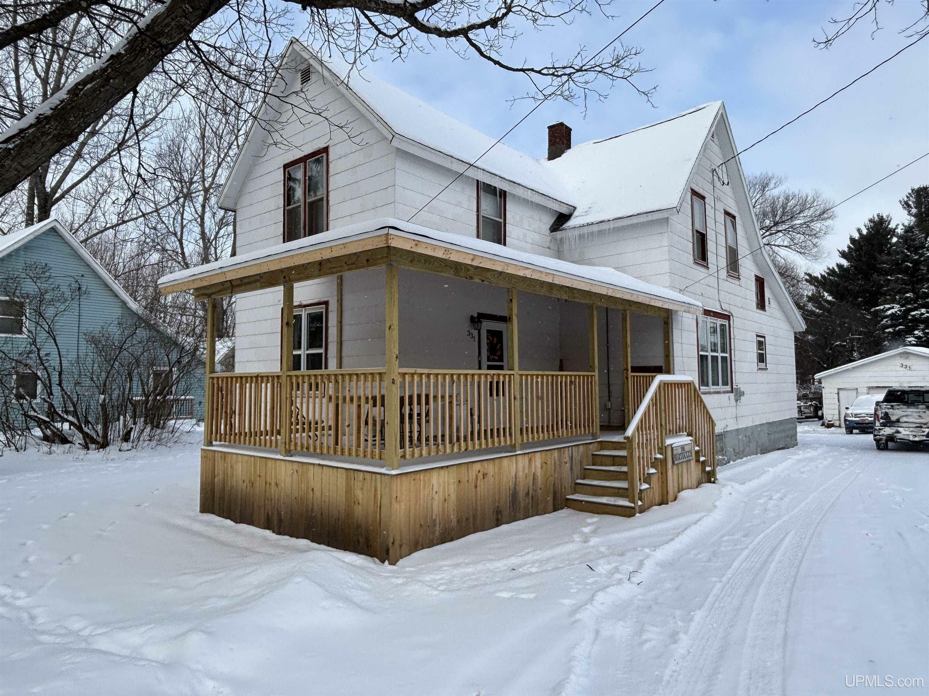 Property Photo:  331 Carp Street  MI 49849 