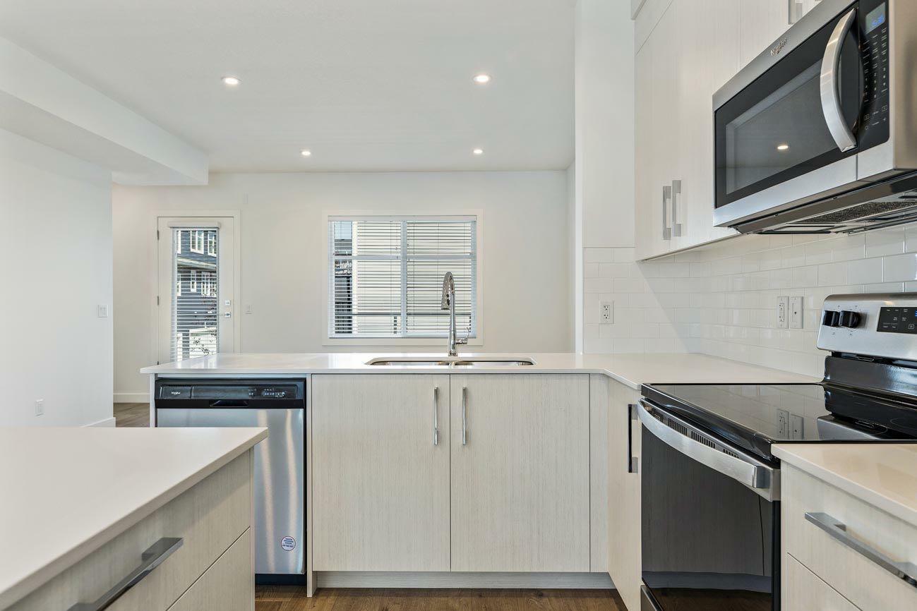 Property Photo:  135 Belmont Passage SW 801  AB T2X 4N4 