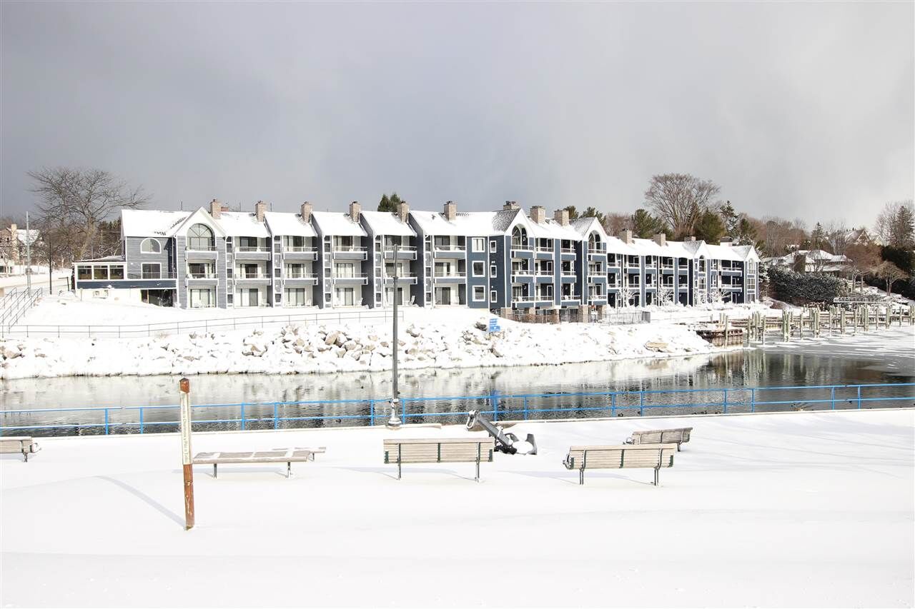 Property Photo:  100 Michigan #117 D  MI 49720-0000 