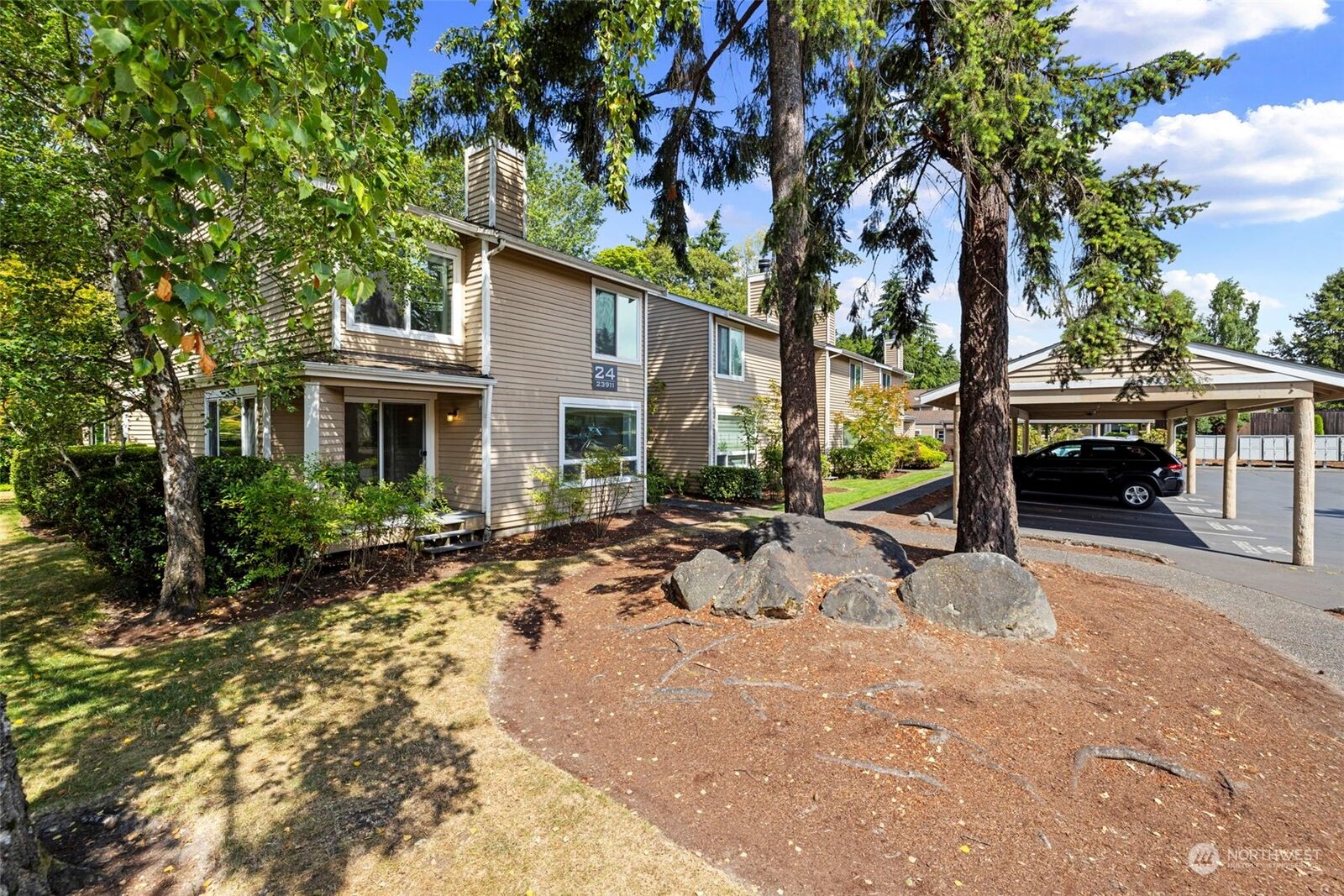 Property Photo:  23911  12th Place S 2405  WA 98198 