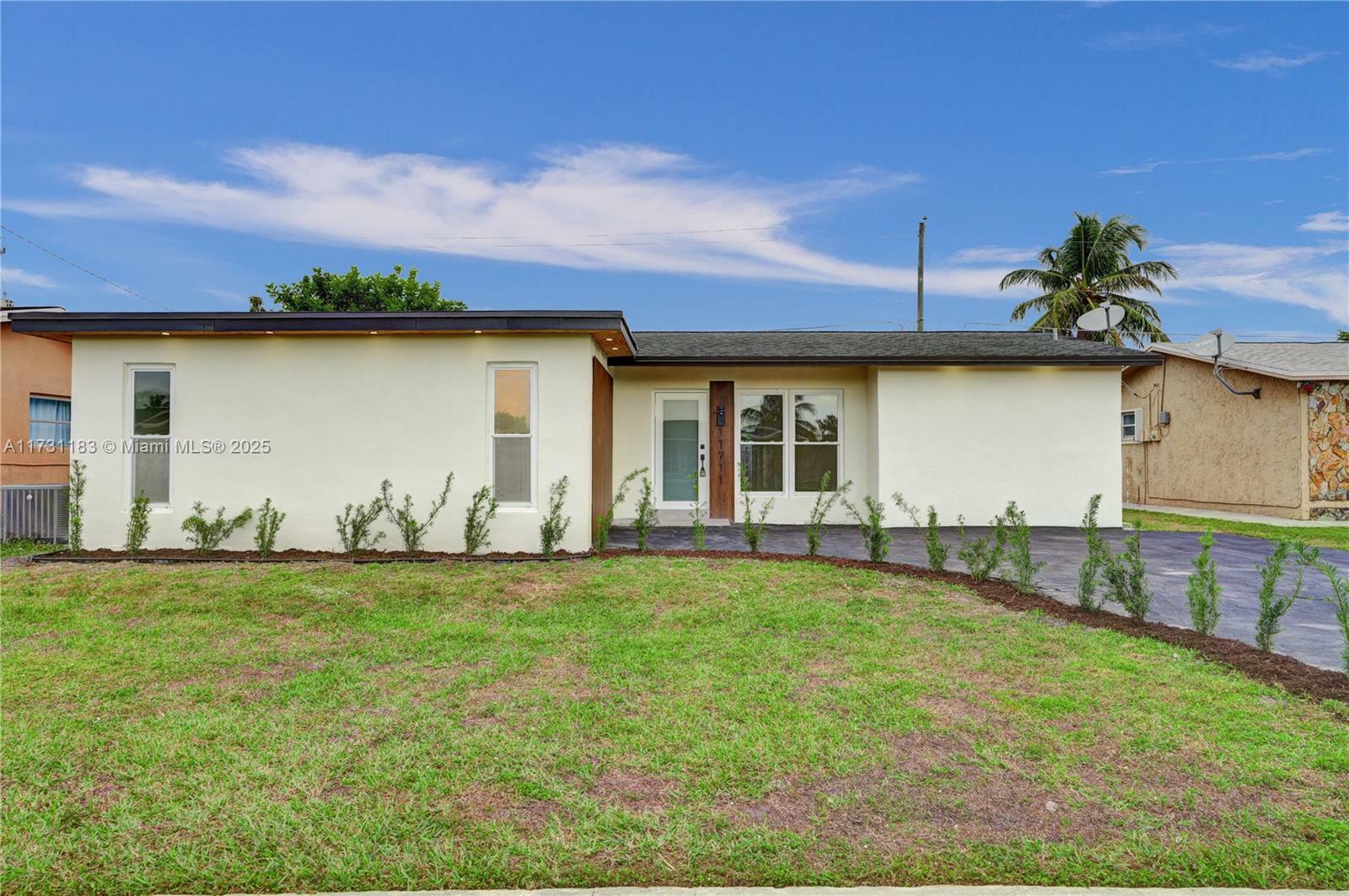 Property Photo:  11711 NW 32nd Mnr  FL 33323 