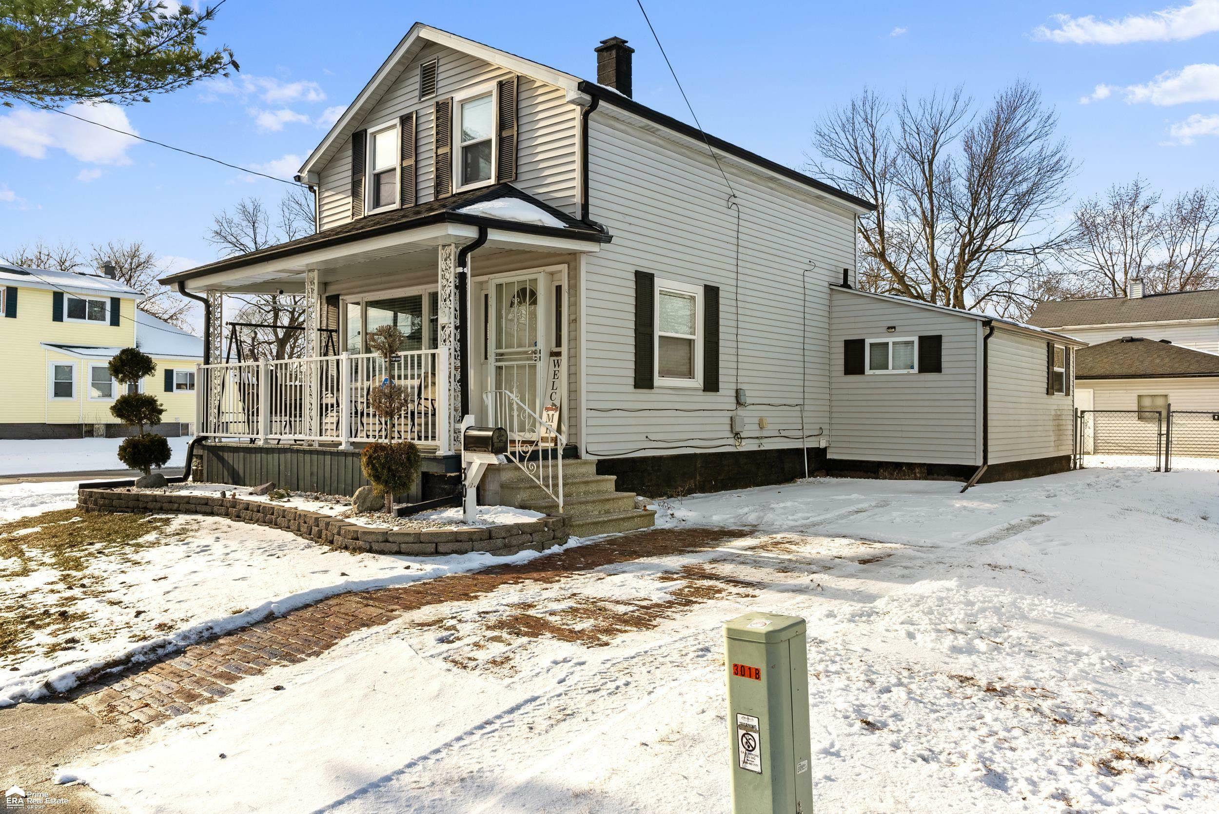 Property Photo:  301 N Bates Street  MI 48602 