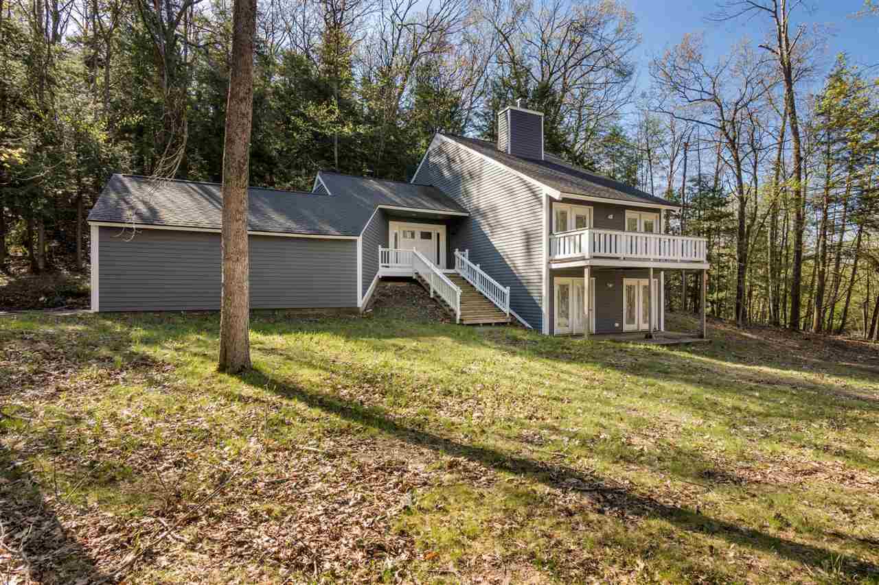 Property Photo:  1458 Timber Pass  MI 49740 