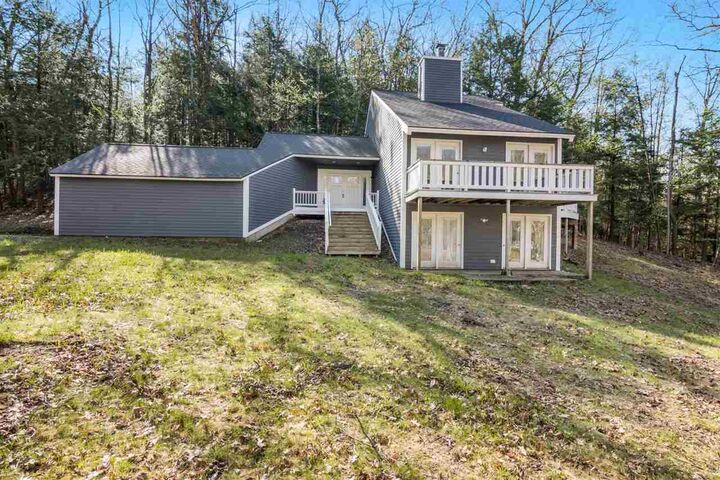 Property Photo:  1458 Timber Pass  MI 49740