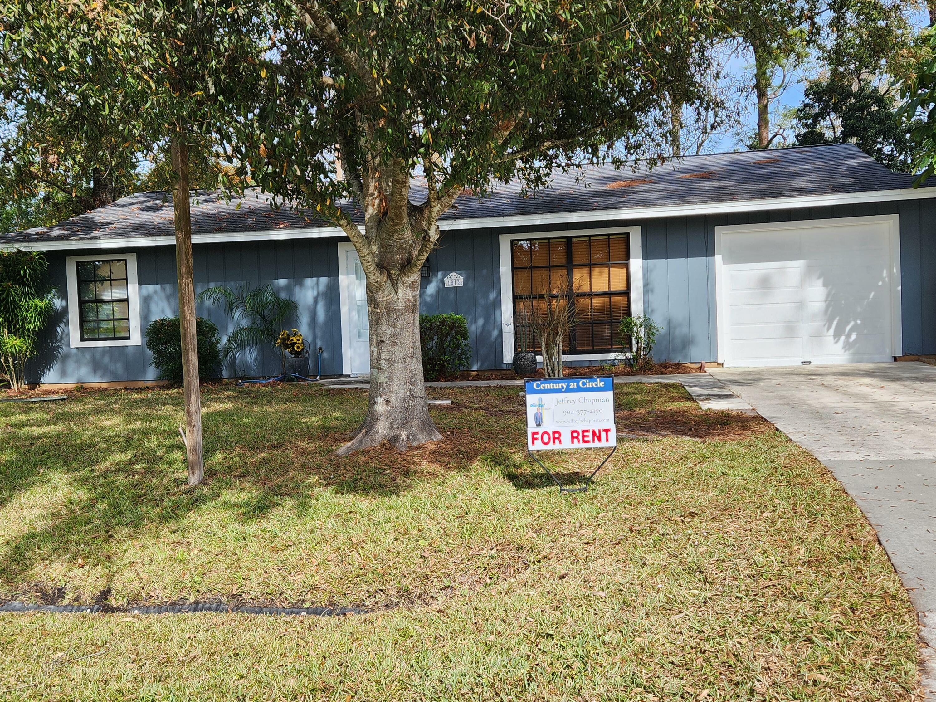 Property Photo: 1813 SW Altman Avenue FL 34953