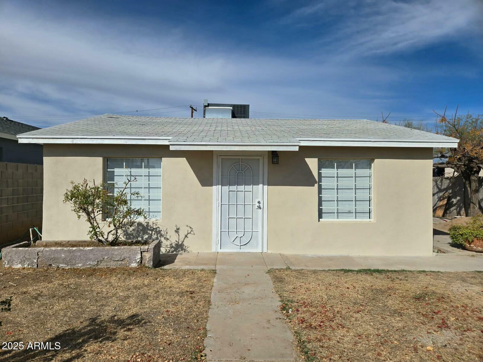 Property Photo:  9156 W Garfield Street  AZ 85353 