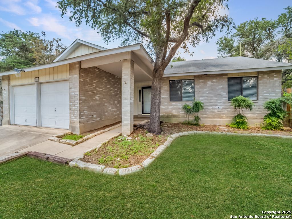 Property Photo: 9011 Woburn St TX 78254