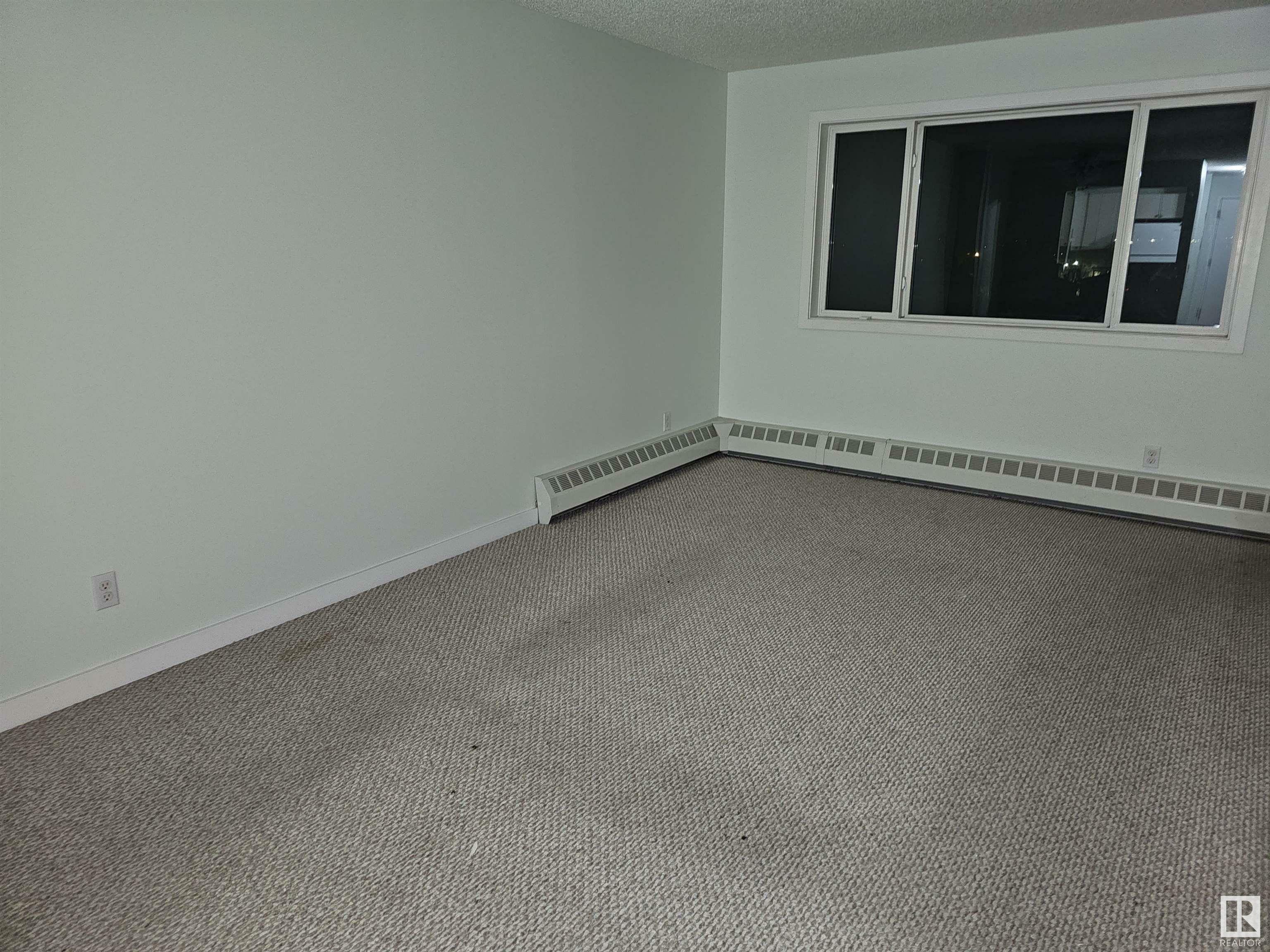 Property Photo:  14808 26 Street NW 407  AB T5Y 2G4 