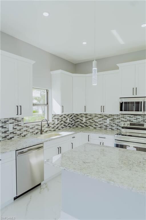 Property Photo: 3107 34th St SW FL 33976