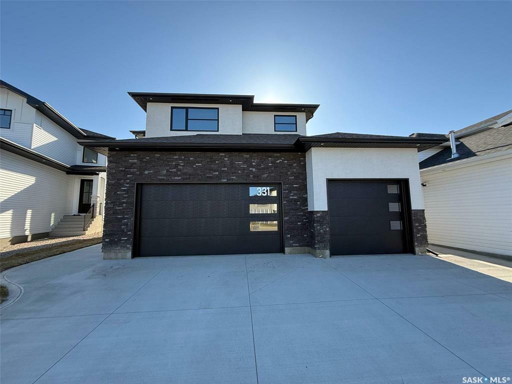 Property Photo: 331 Woolf Bay SK S7W 1E5