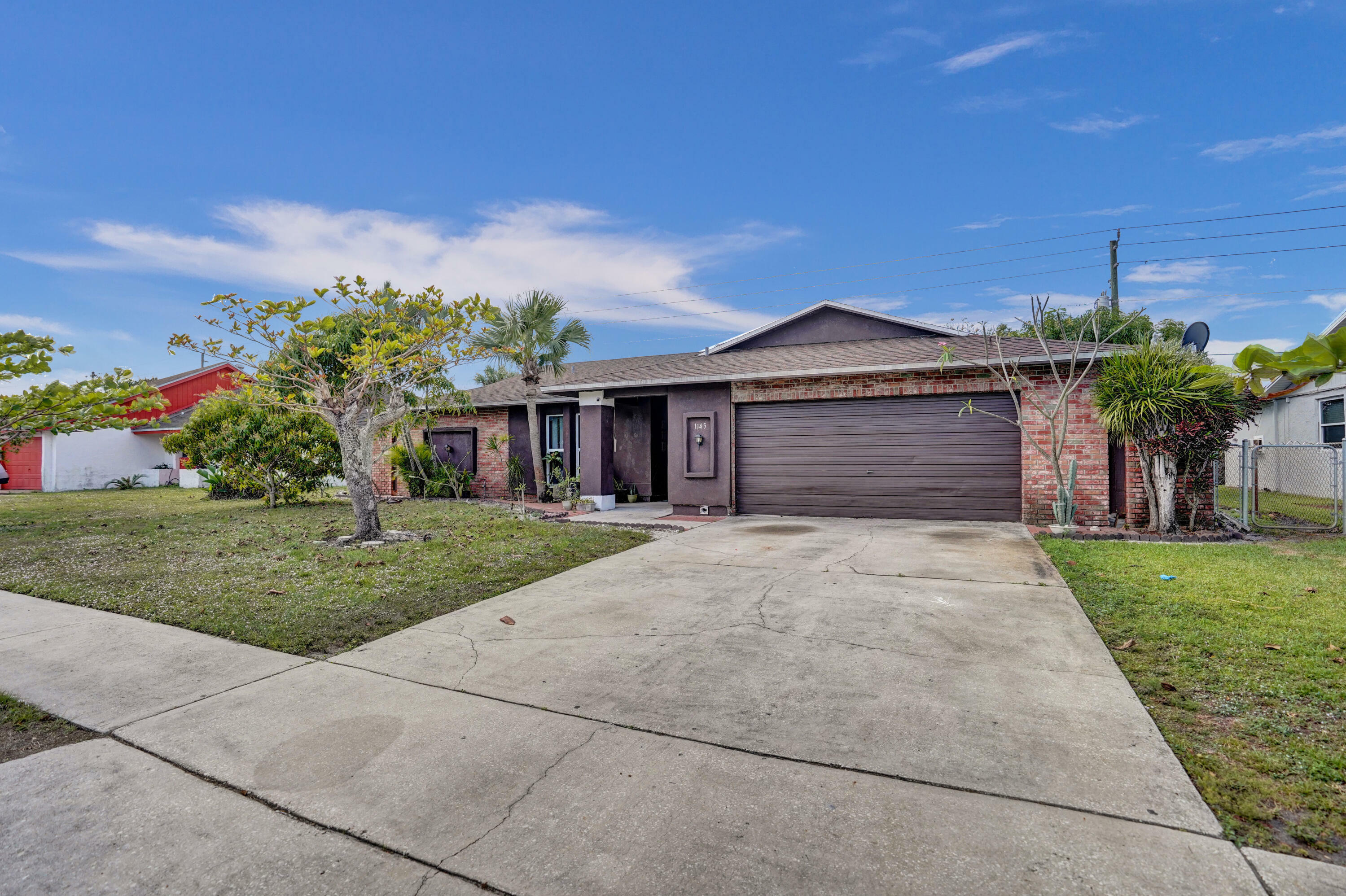 Property Photo:  1145 Fernlea Drive  FL 33417 