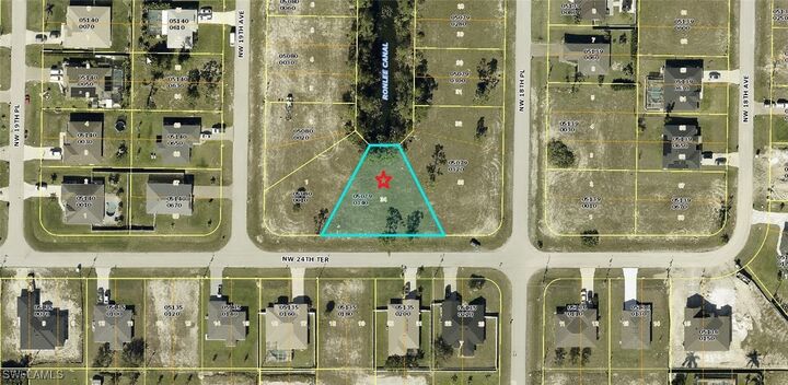 Property Photo:  1831 NW 24th Terrace  FL 33993 