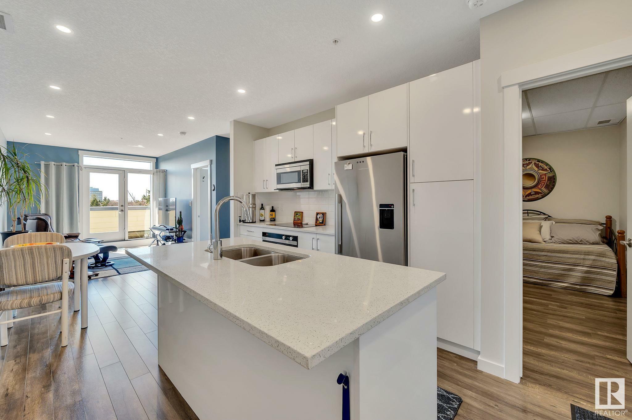 Property Photo: 11503 76 Avenue NW 408 AB T6G 0K6