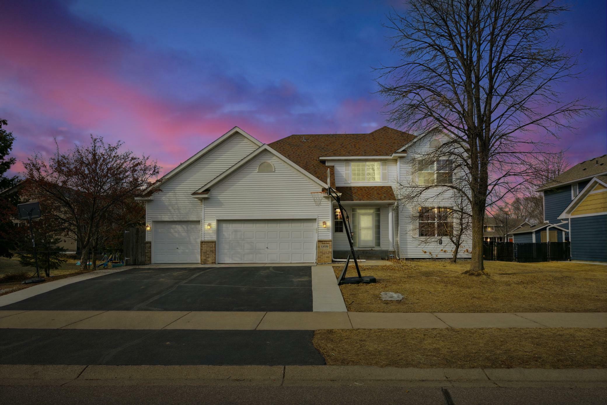 Property Photo: 10009 Butternut Avenue N MN 55443