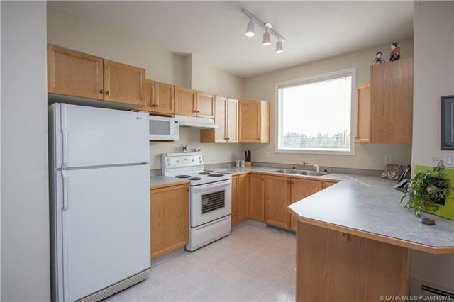 Property Photo:  5217 39 Street 204  AB T4N 0Z8 