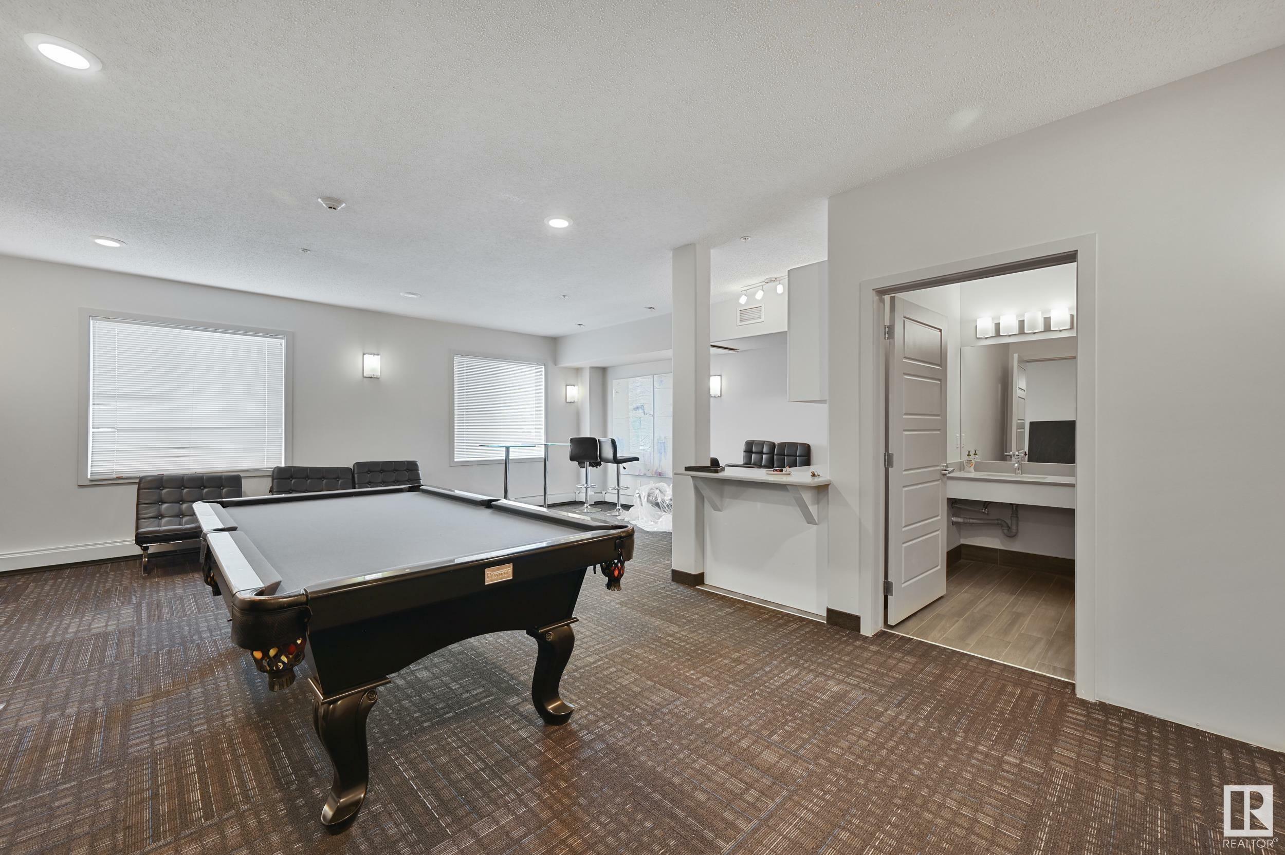 Property Photo: 320 Ambleside Link SW 305 AB T6W 2Z9