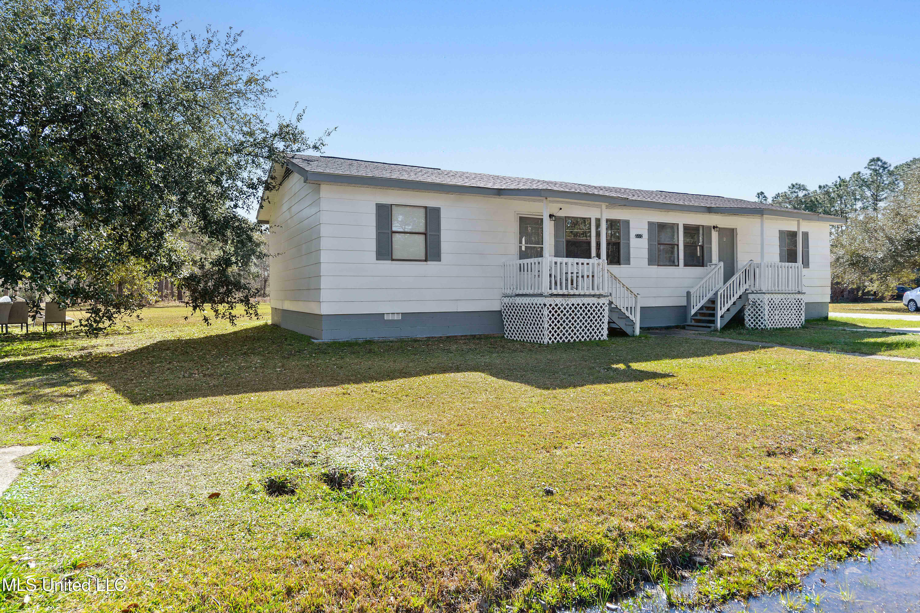 Property Photo:  6558 Simmons Drive  MS 39560 