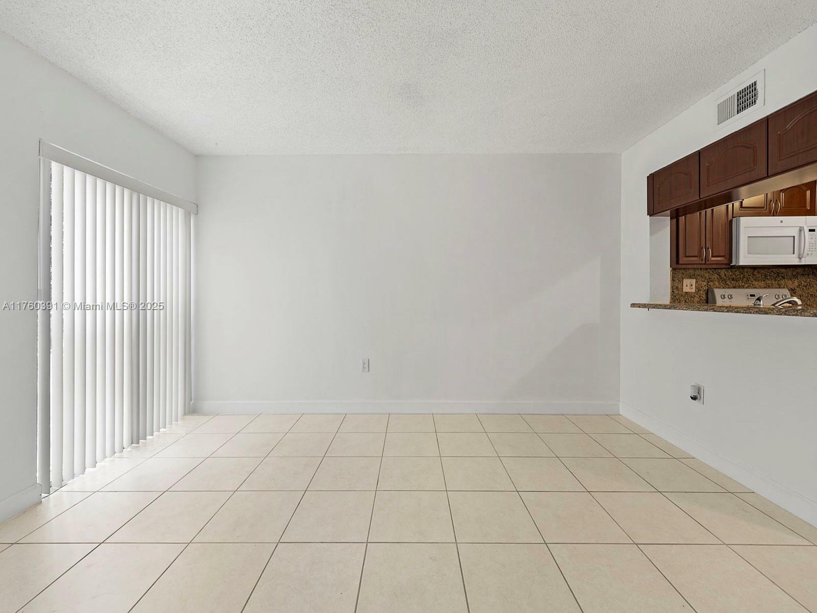 Property Photo: 8585 NW 6th Ln 9-208 FL 33126