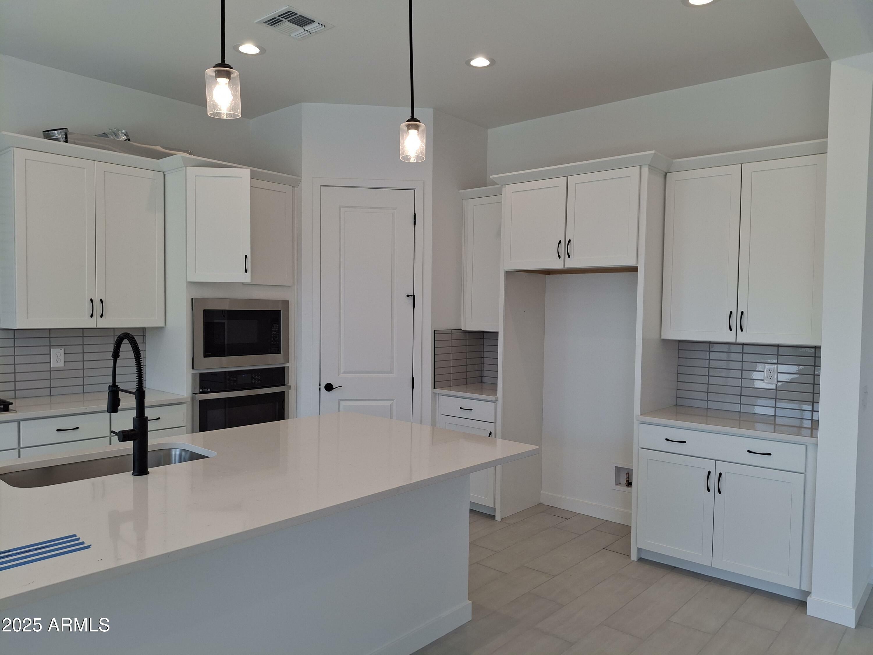 Property Photo: 24116 N 172nd Avenue AZ 85387