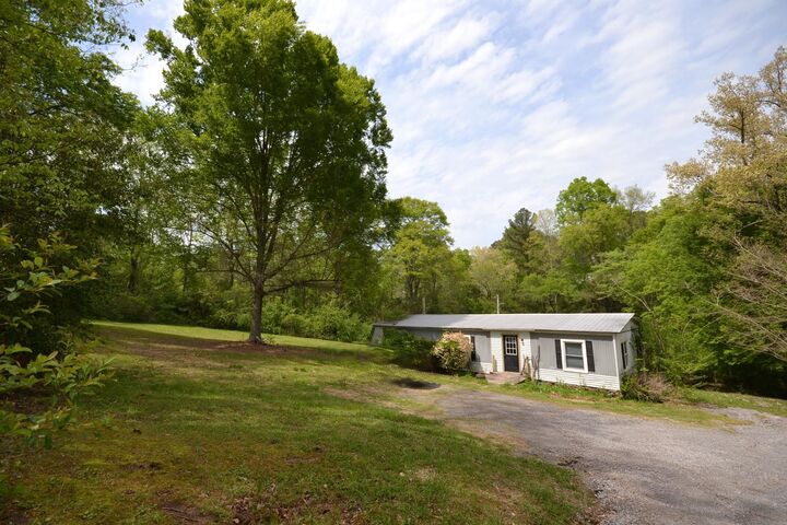 Property Photo:  1509 3rd Ave NE  AL 35179 - VINEMONT 