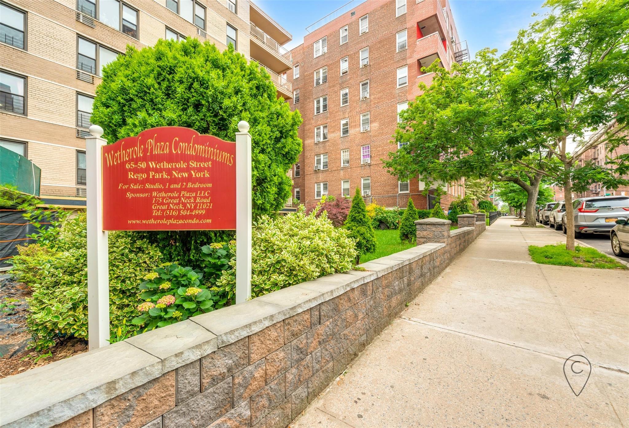 Property Photo: 65-50 Wetherole Street 1Z NY 11374