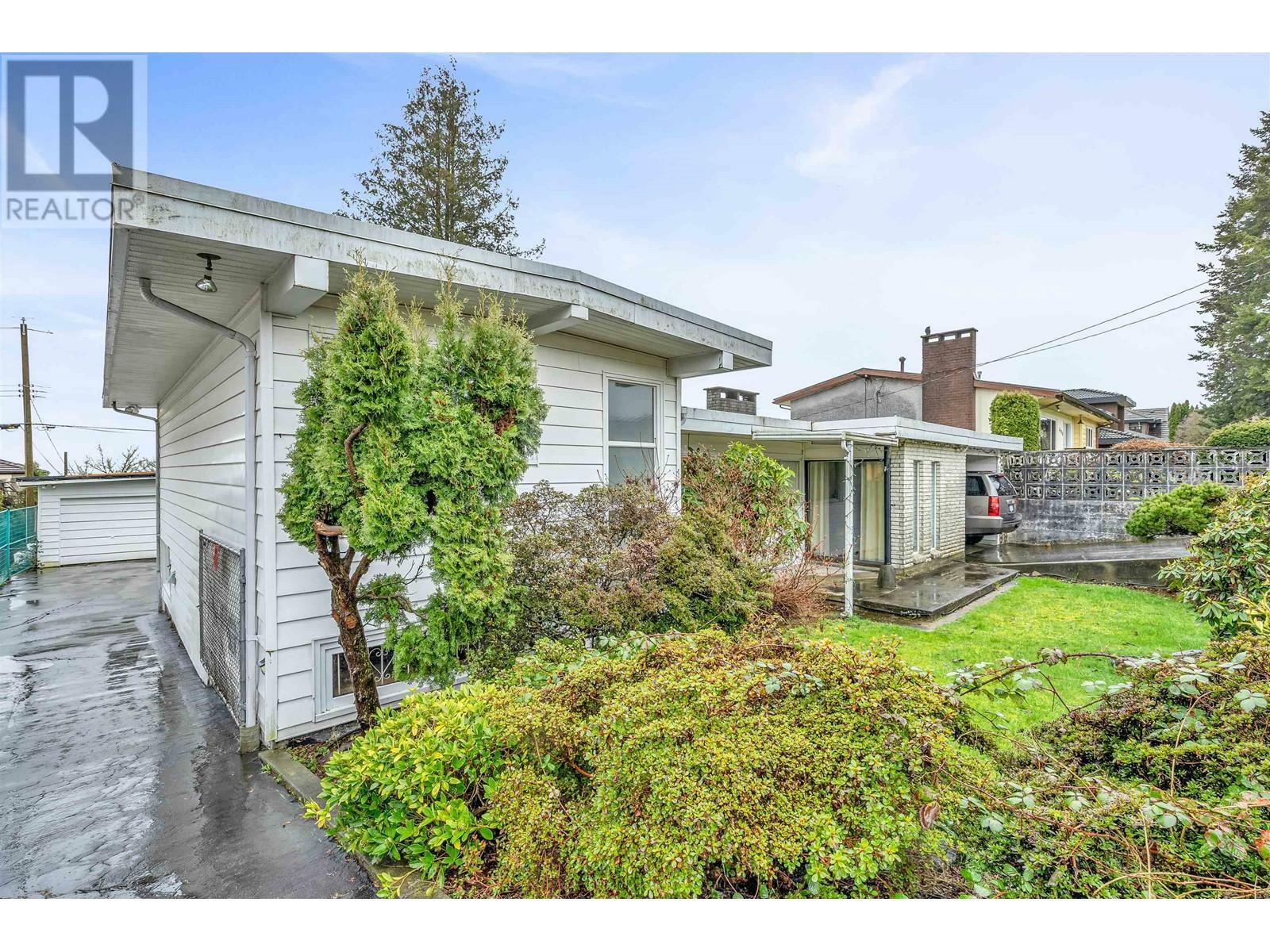 Property Photo: 6242 Kitchener Street BC V5B 2J4