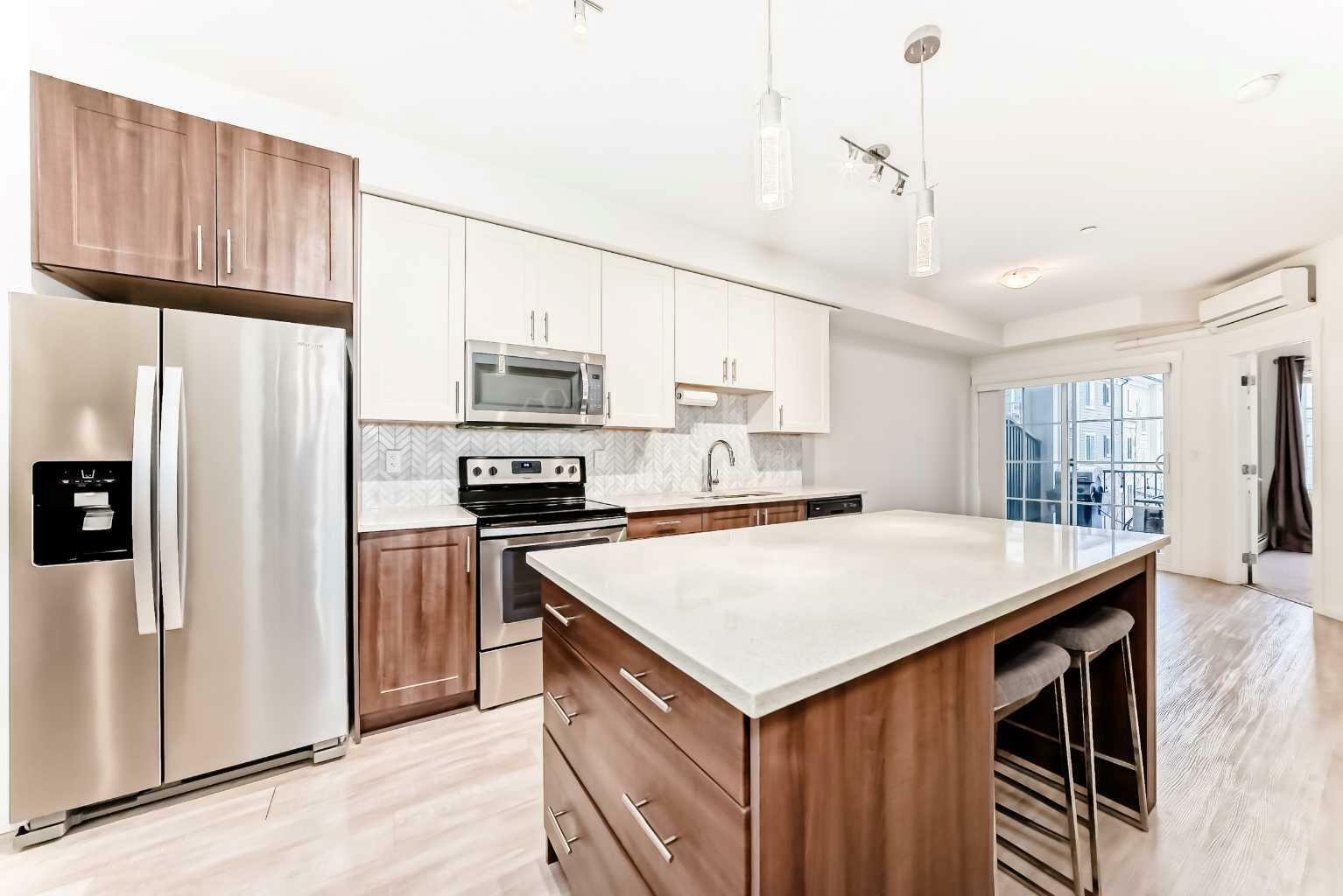 Property Photo: 215 Legacy Boulevard SE 4317 AB T2X 3Z4