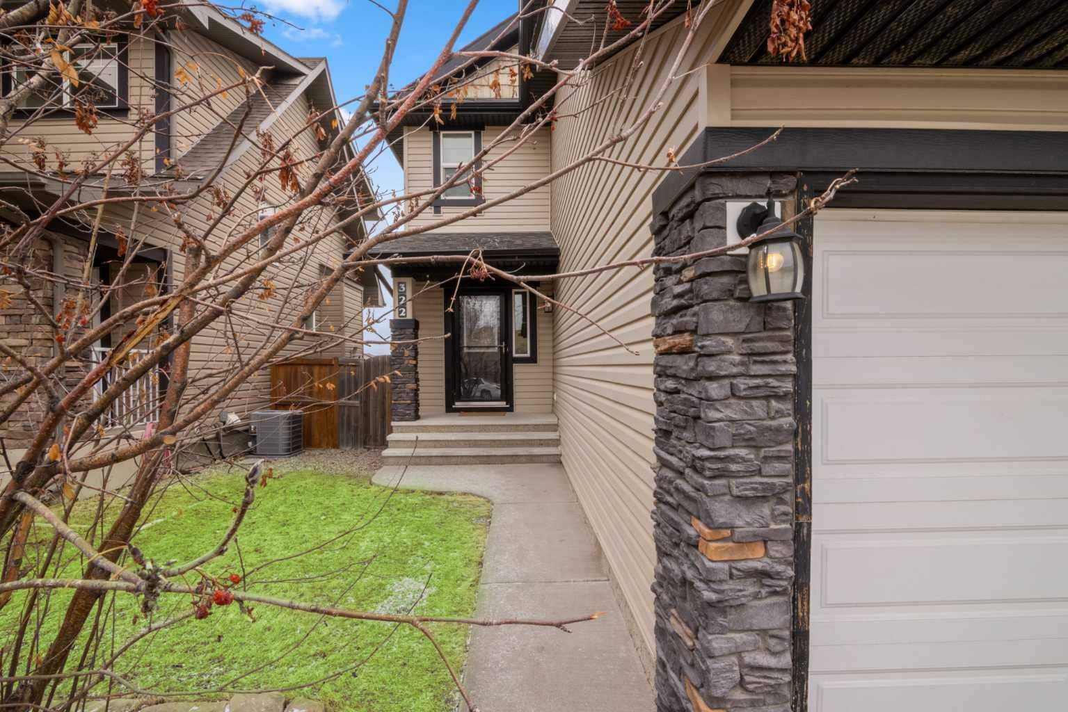 Property Photo:  322 Coopers Drive SW  AB T4B 0L8 