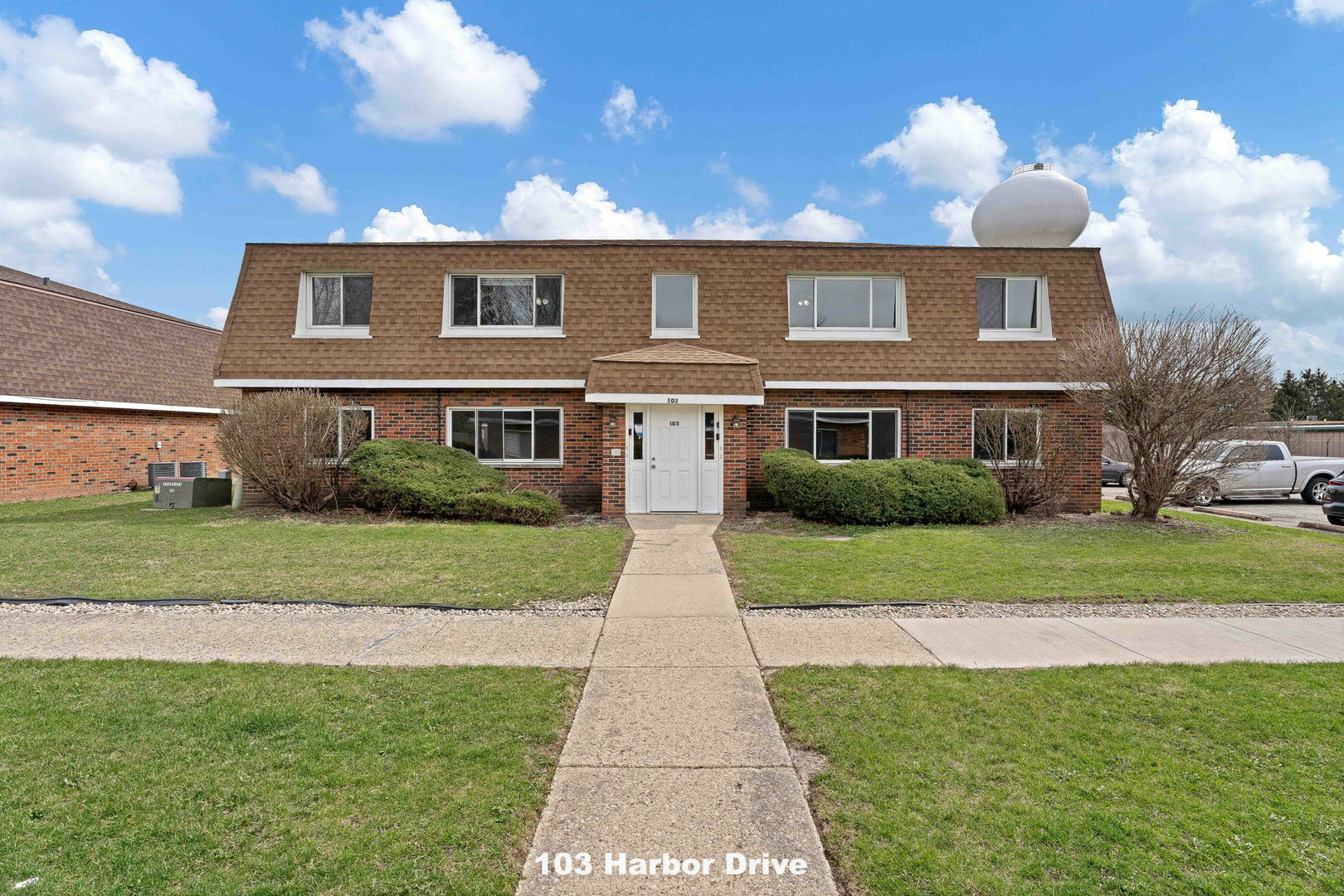Property Photo: 103 Harbor Drive A IL 60543