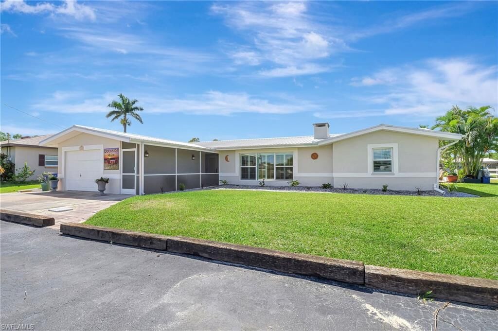 Property Photo:  1230 Betmar Blvd  FL 33903 