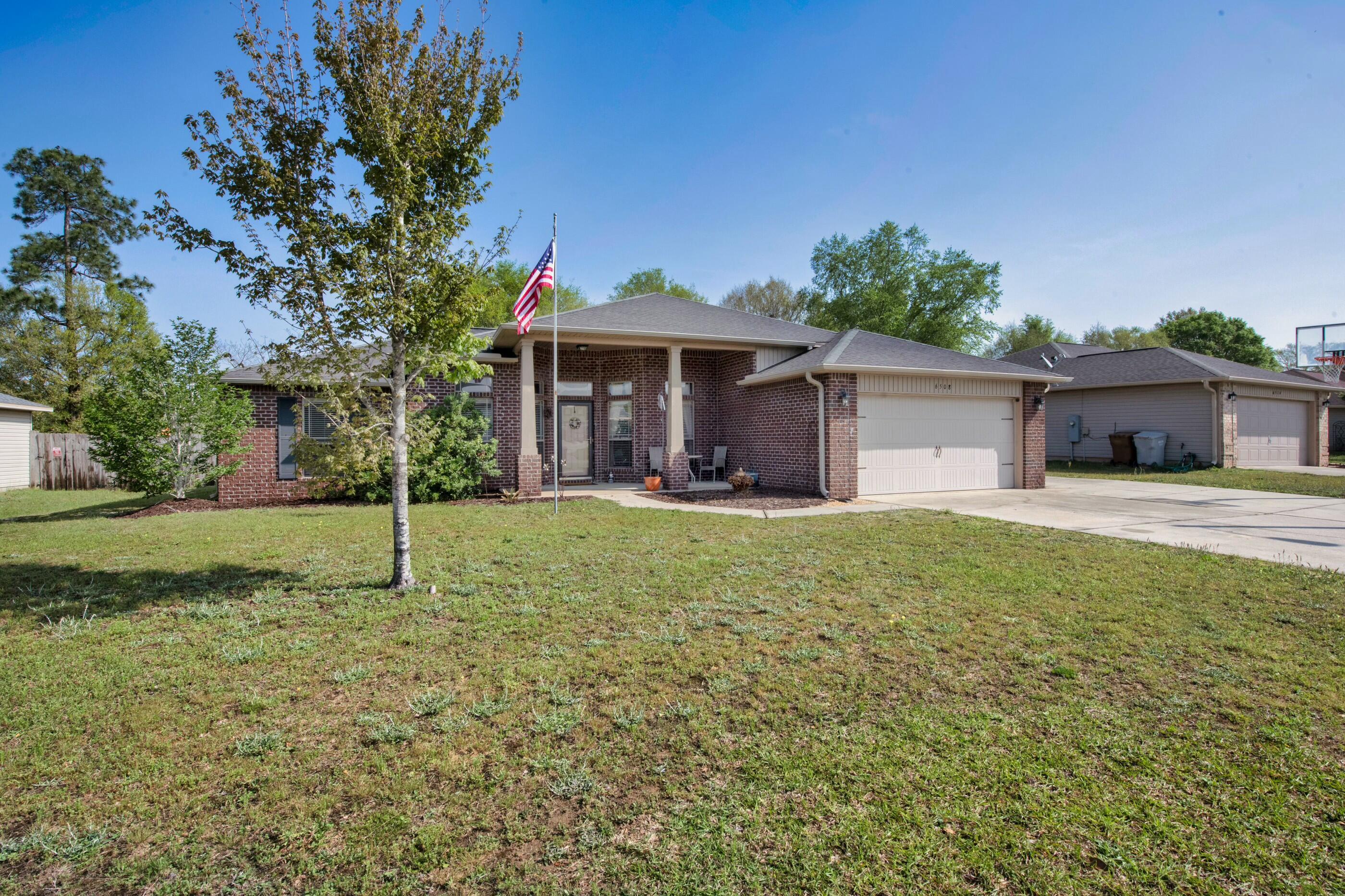 Property Photo:  6508 Fall Street  FL 32570 