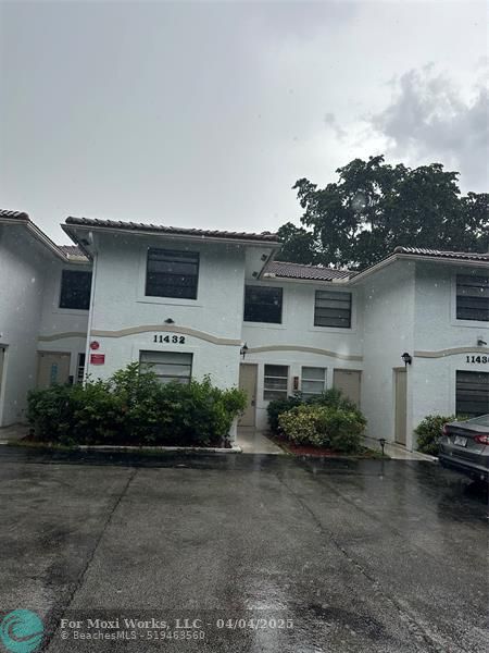 Property Photo: 11430-11434 NW 39th St FL 33065