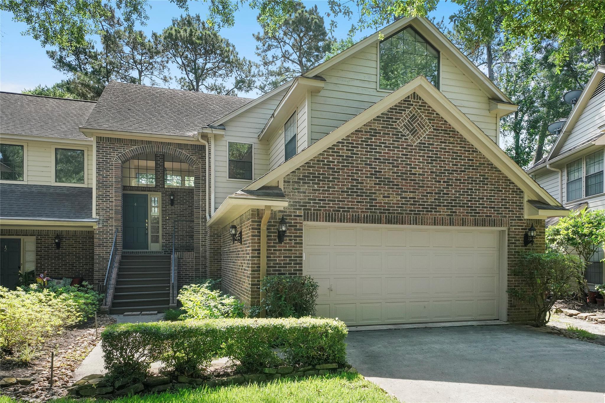 Property Photo: 4 Fairway Oaks Place 4 TX 77380
