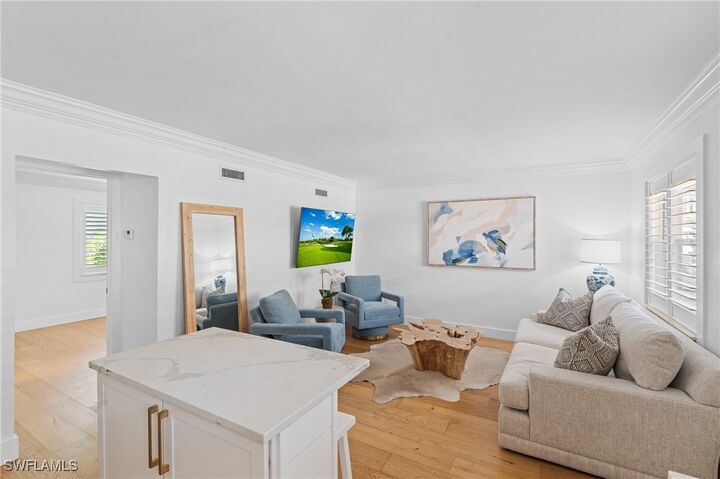 Property Photo:  980 7th Avenue S 107  FL 34102 