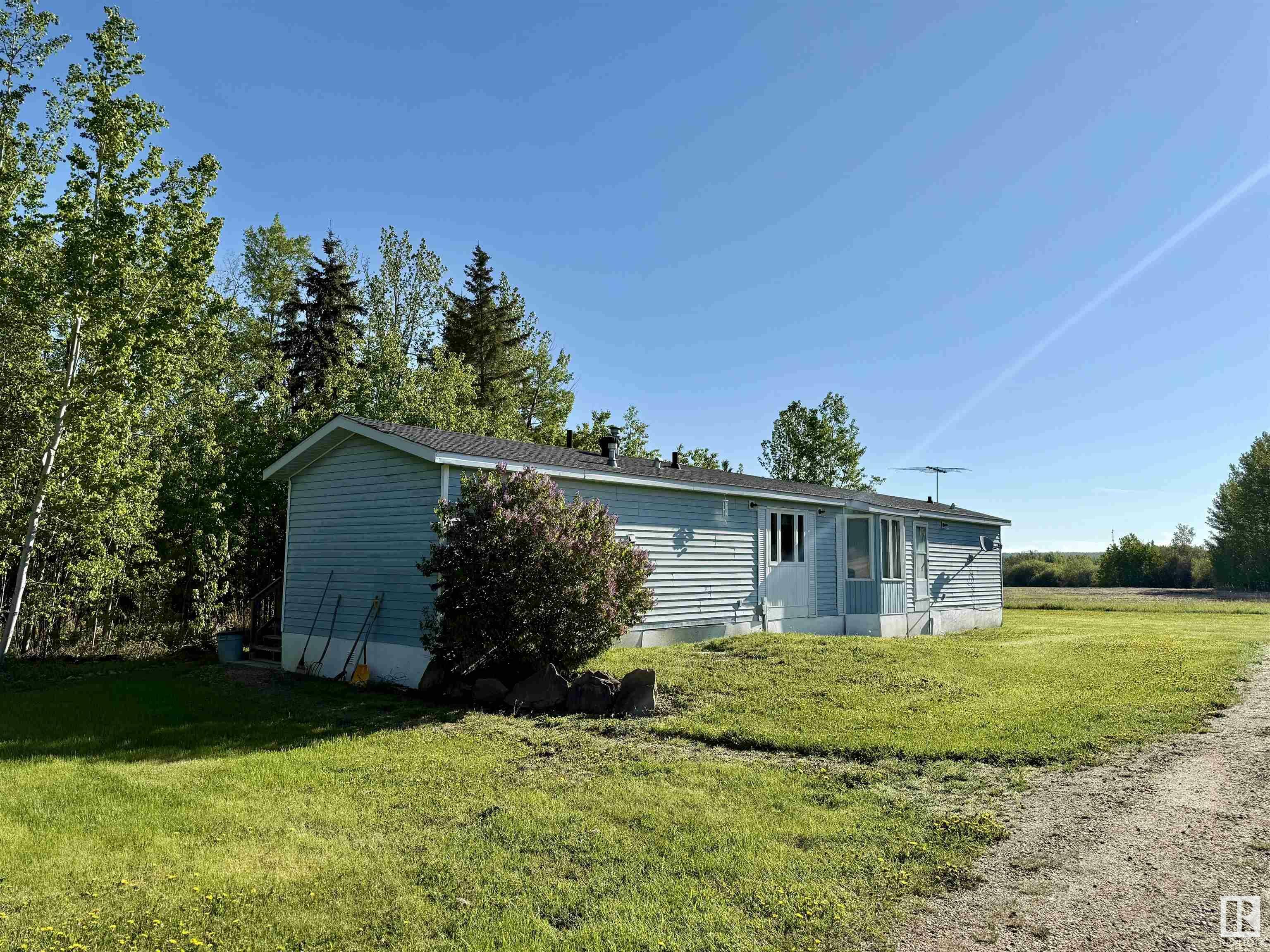 Property Photo: 53127 Range Road 93 AB T0J 1J0