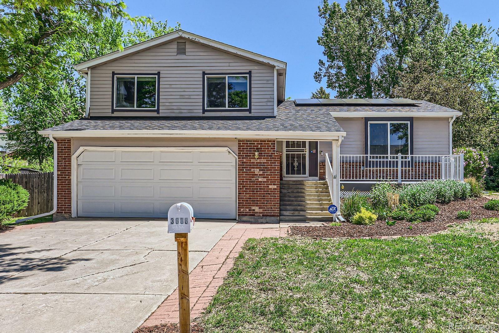 Property Photo: 3686 S Yampa Way CO 80013