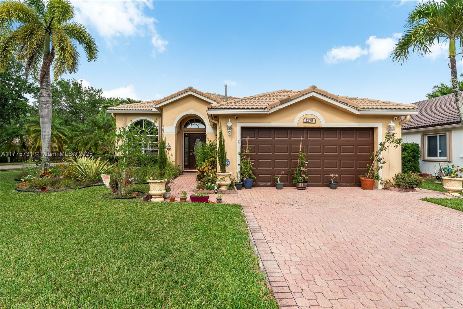 Property Photo: 1275 NW 144th Ave FL 33028