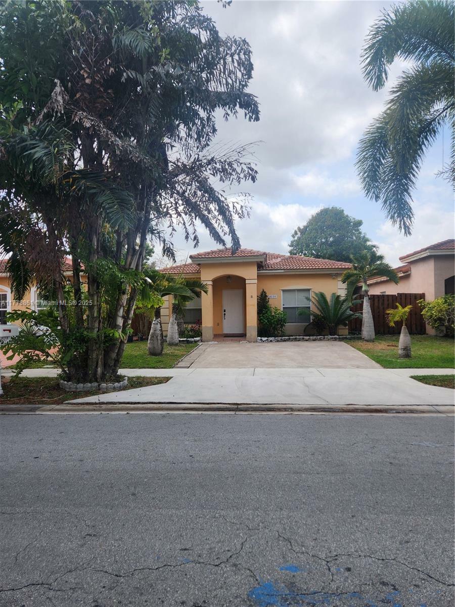 Property Photo:  8118 NW 200th St  FL 33015 