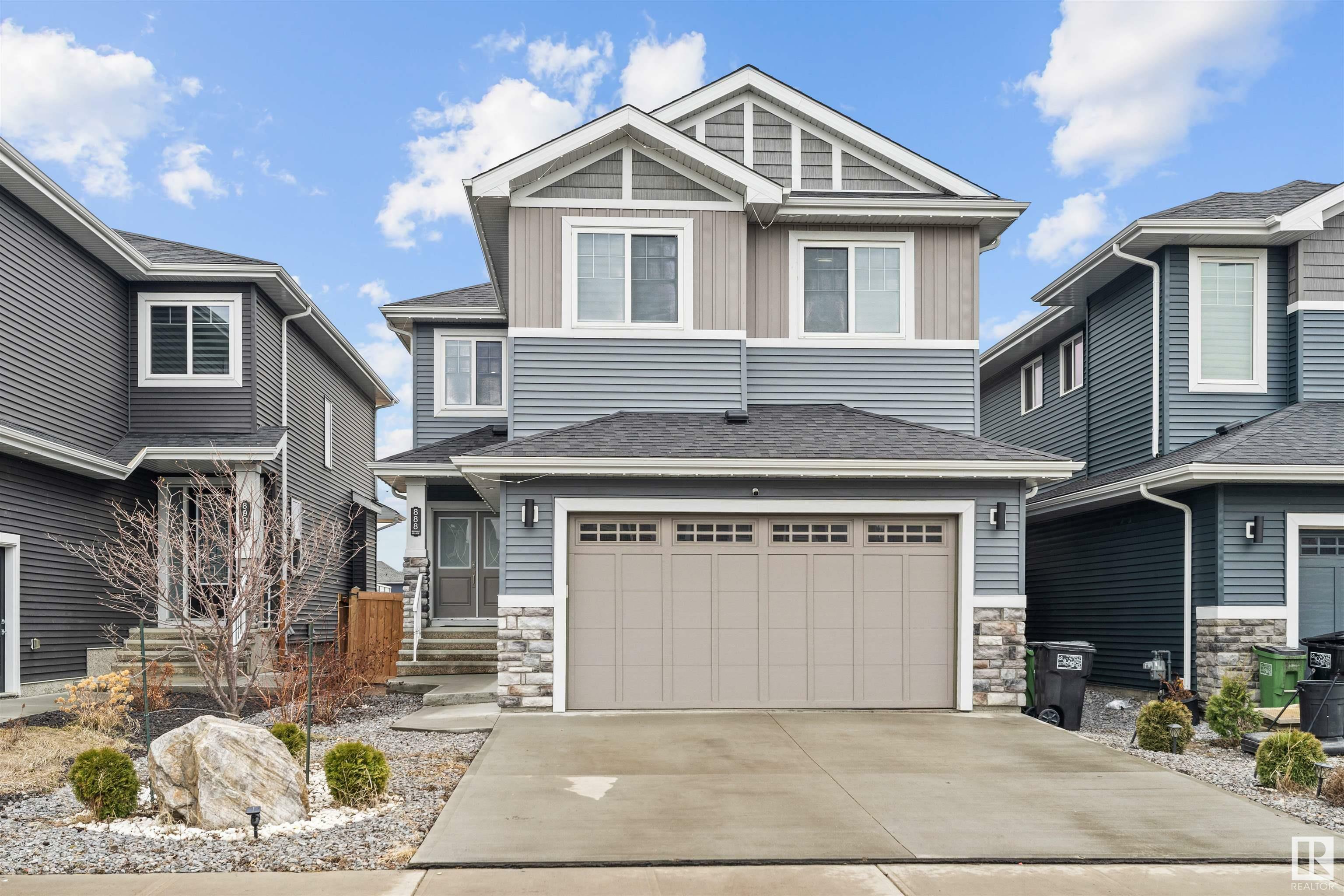 Property Photo: 888 Ebbers Crescent NW AB T5Y 3V1