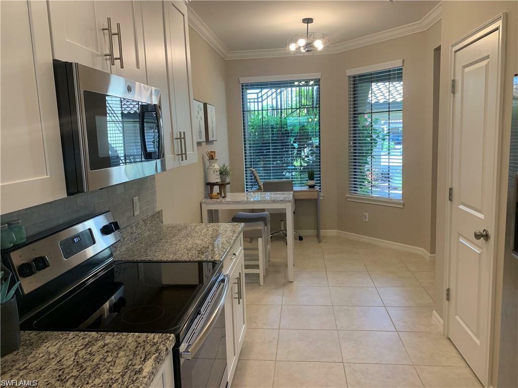 Property Photo: 9433 Benvenuto Ct 5-101 FL 34119