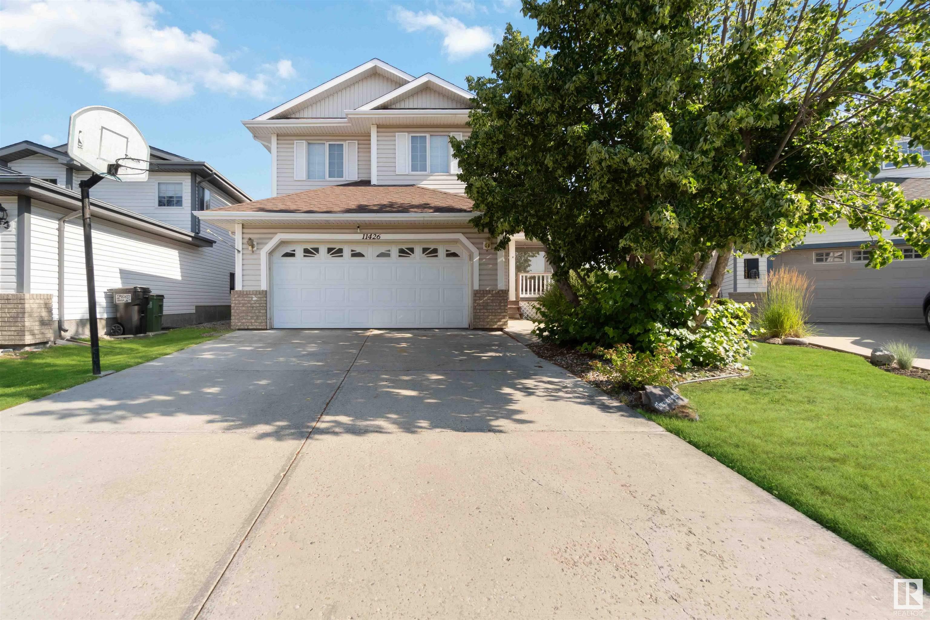 Property Photo:  11426 9A Avenue NW  AB T6J 7B2 