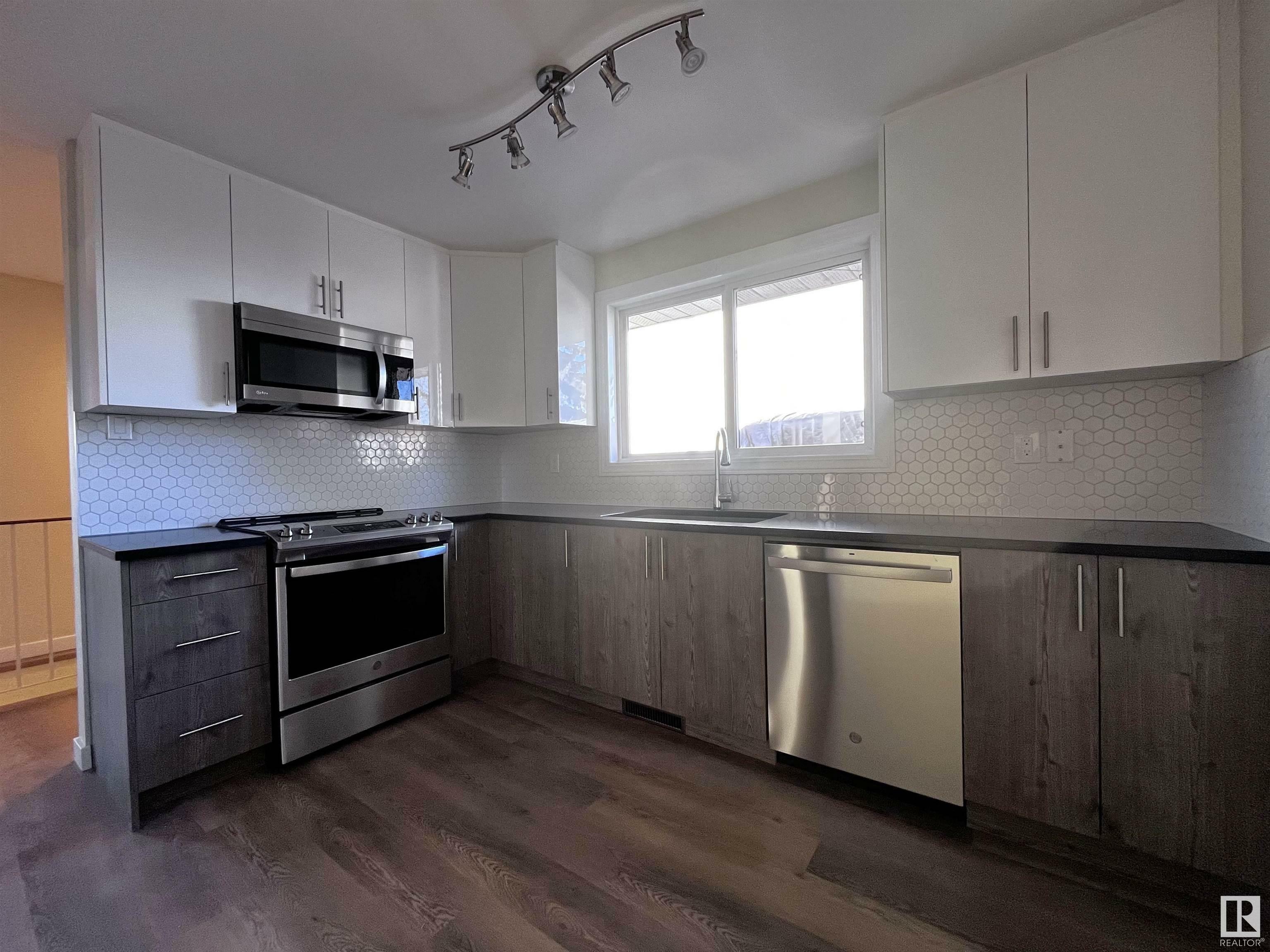 Property Photo:  17319 82 Avenue NW  AB T5T 0K4 