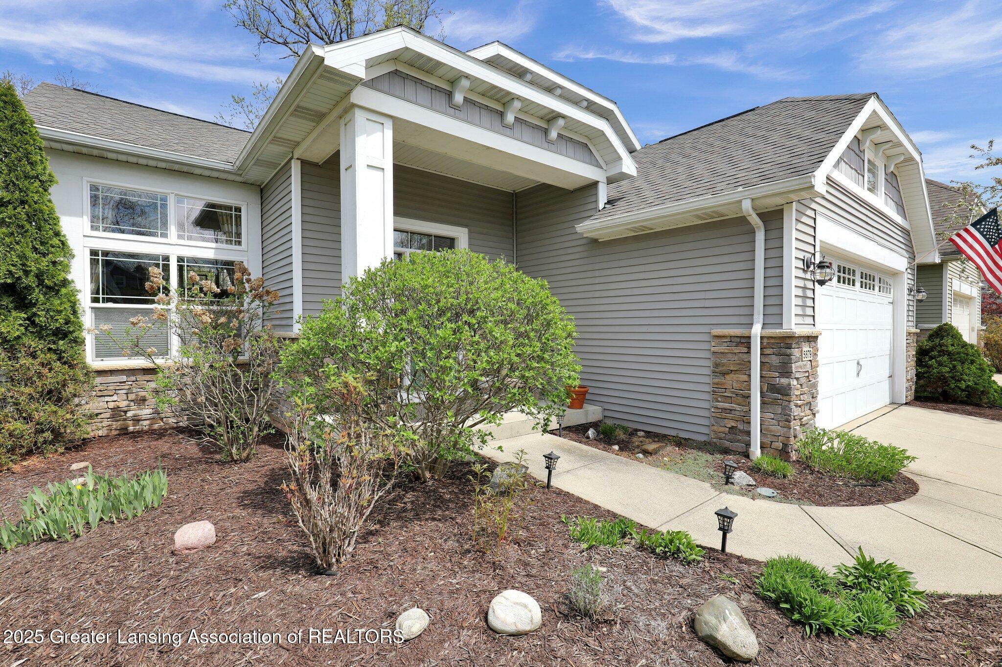 Property Photo: 5879 Chartres Way MI 48823
