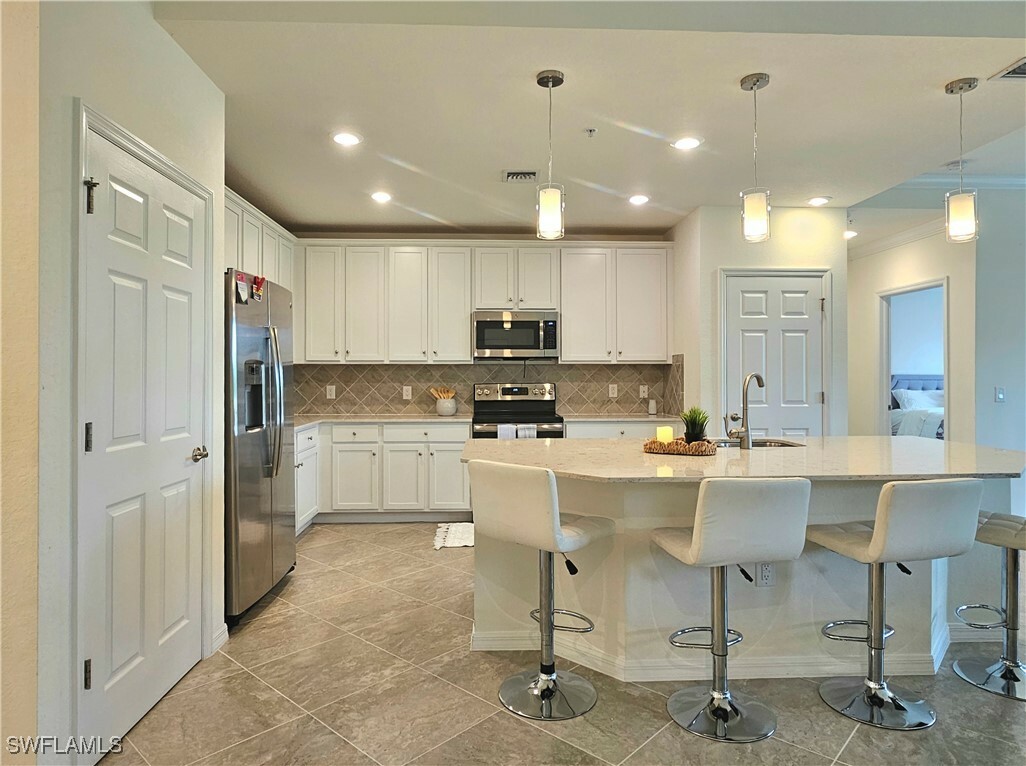 Property Photo: 11768 Grand Belvedere Way 103 FL 33913
