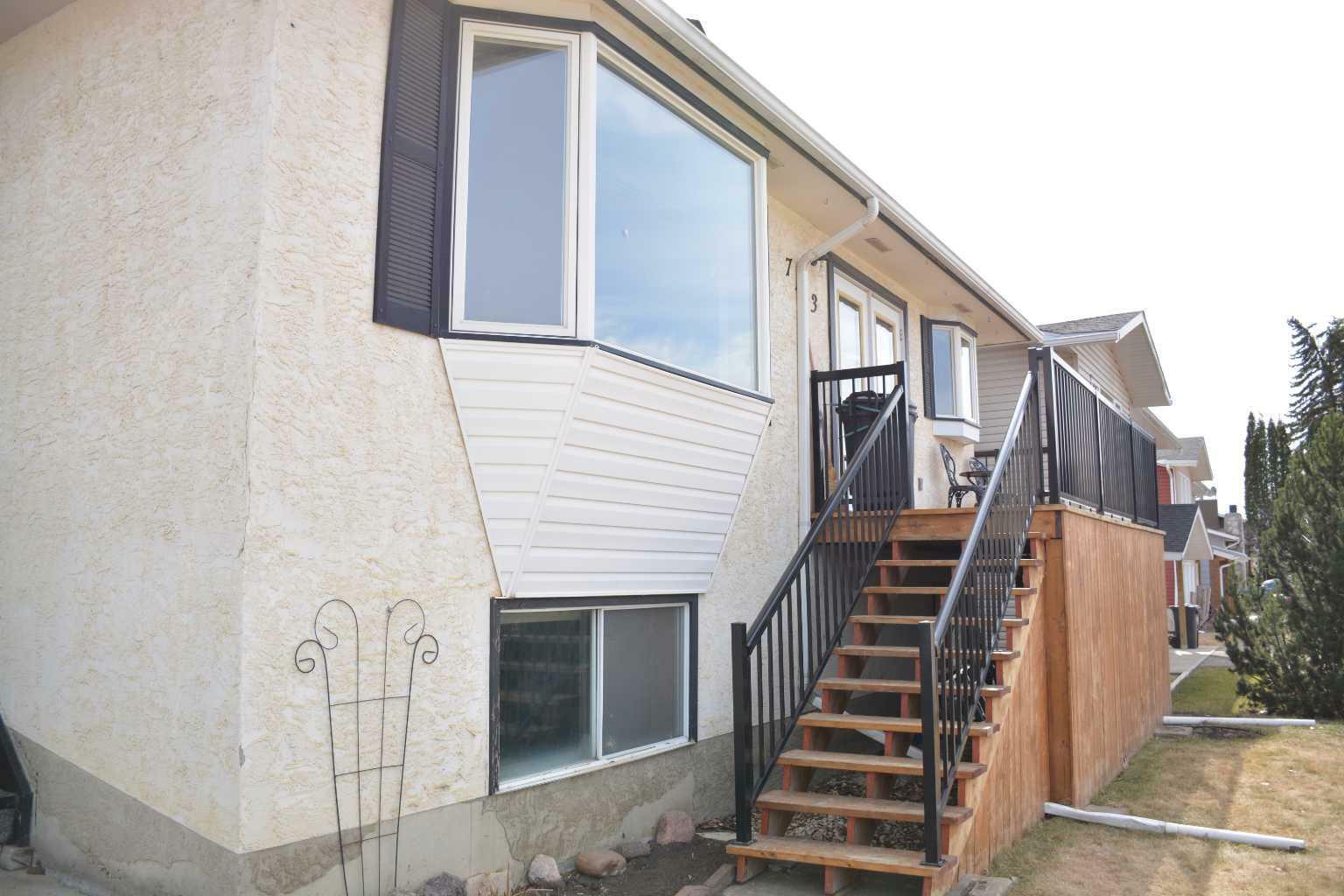 Property Photo: 7113 99 Street AB T8S 1B3