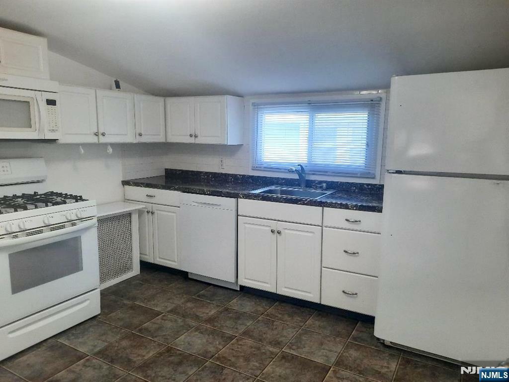 Property Photo:  21 10th Avenue  NJ 07506 