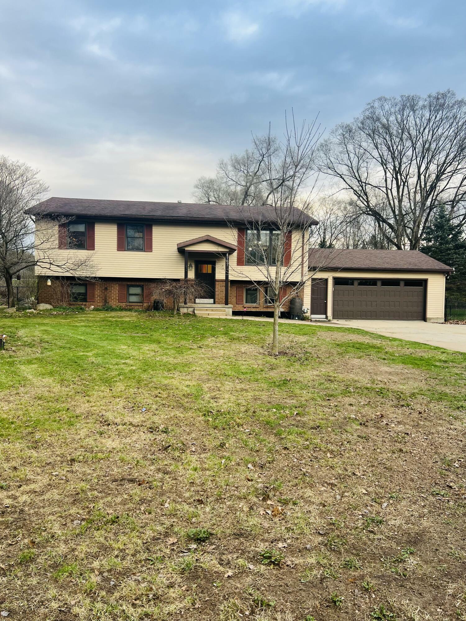 Property Photo: 4757 Shank Street NE MI 49341