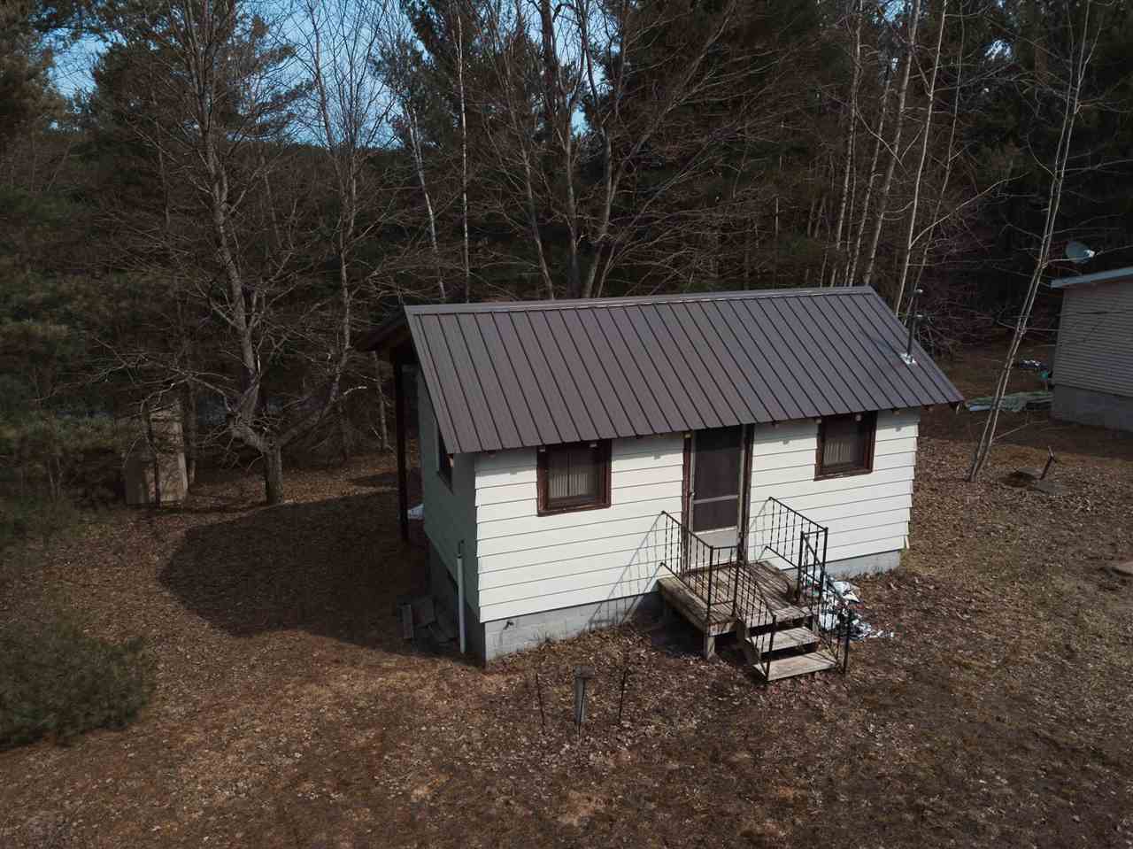 Property Photo:  11457 NE Starvation Lake  MI 49659 